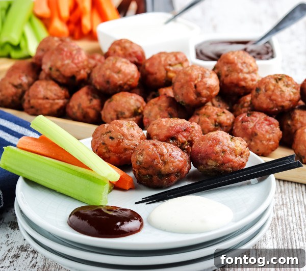 Close-up of perfectly smoked meatballs on a wooden board, ready to be enjoyed