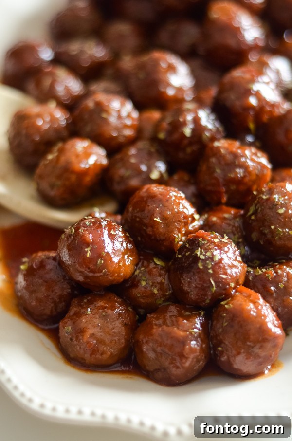 Ninja Foodi Grape Jelly Meatballs in a serving dish