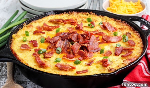 Ember Mashed Potatoes 5 A bowl of creamy, freshly mashed potatoes, ready for the next steps of the recipe.