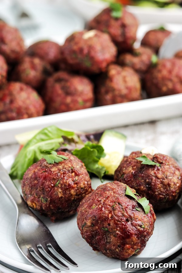 Smoked Stuffed Meatballs with other foods on the grill