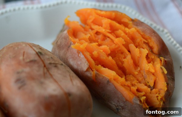 Ultimate Pellet Grill Smoked Sweet Potatoes 4 A selection of wood pellets for smoking sweet potatoes, showcasing different flavors like hickory, apple, and cherry.