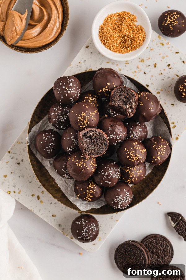Gluten-free truffles neatly arranged in an airtight container for storage.