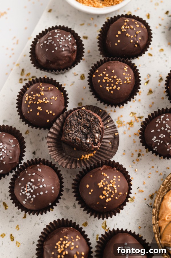 A festive display of gluten-free truffles on a tiered serving tray.