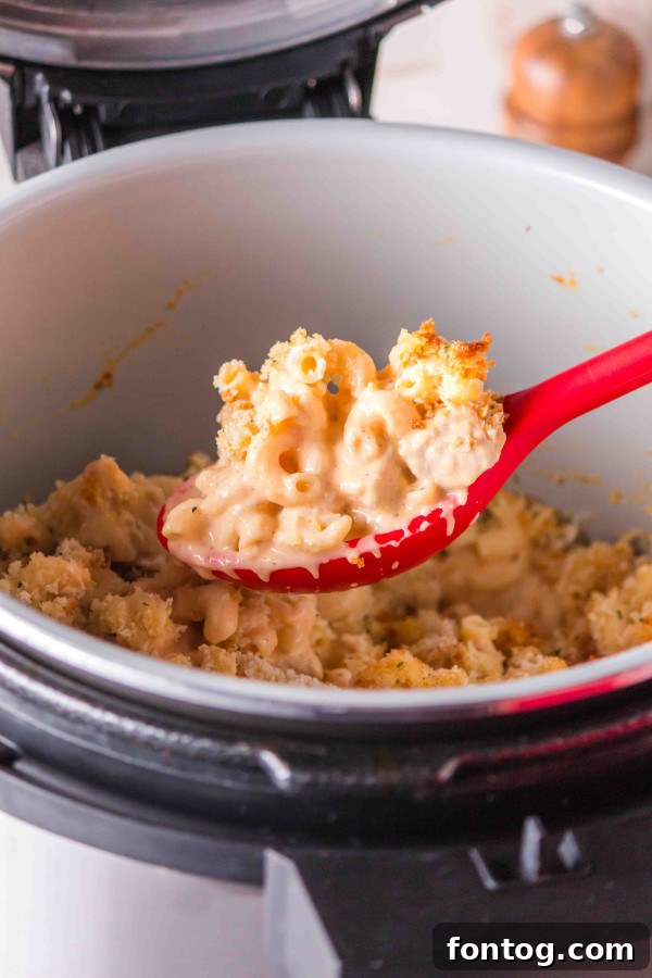 Leftover Ninja Foodi Buffalo Macaroni and Cheese in an airtight container for storage.