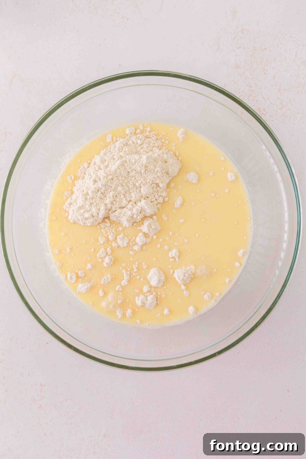 Homestyle Cheeseburger Pie 3 Gluten-free cheeseburger pie assembled in a pie dish, ready for baking