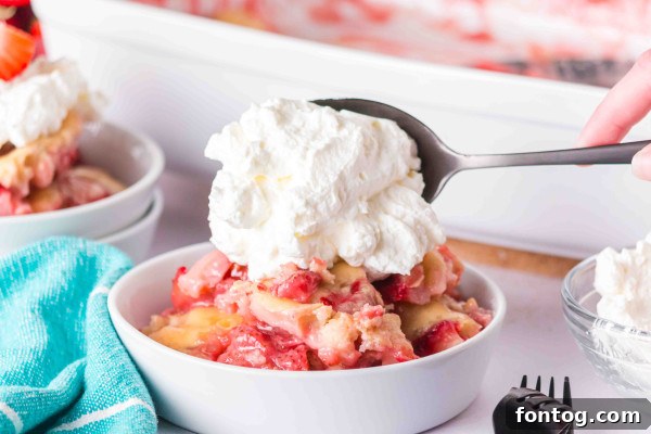 two portions of gluten-free strawberry cobbler in small bowls