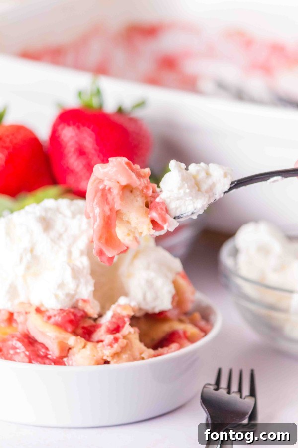 a large baking dish filled with gluten-free strawberry cobbler