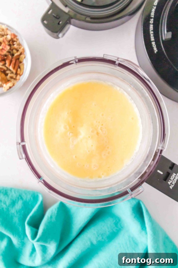 Ninja Creami Butter Pecan Bliss 6 Mixing butter pecan ice cream base in a bowl