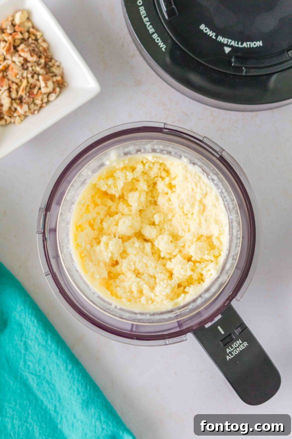 Ninja Creami Butter Pecan Bliss 7 Ninja Creami pint ready for processing