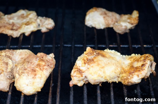 Preparing chicken thighs with jerk seasoning