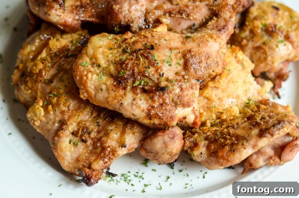 Finished pellet grill jerk chicken on the grates