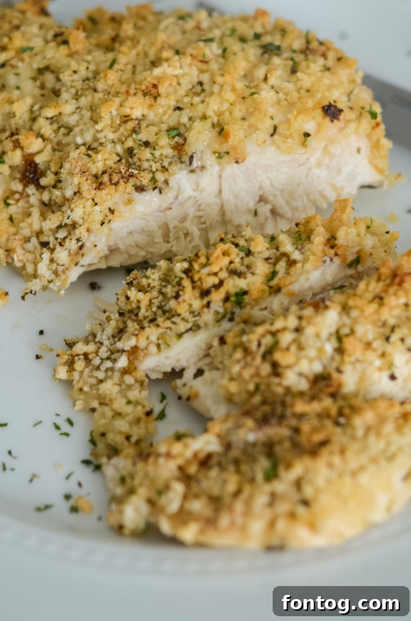 Close up of gluten-free shake and bake chicken with a meat thermometer