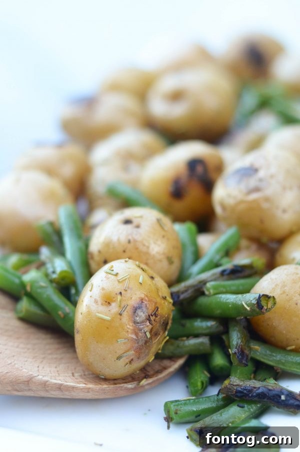 Plated pellet grill green beans and potatoes