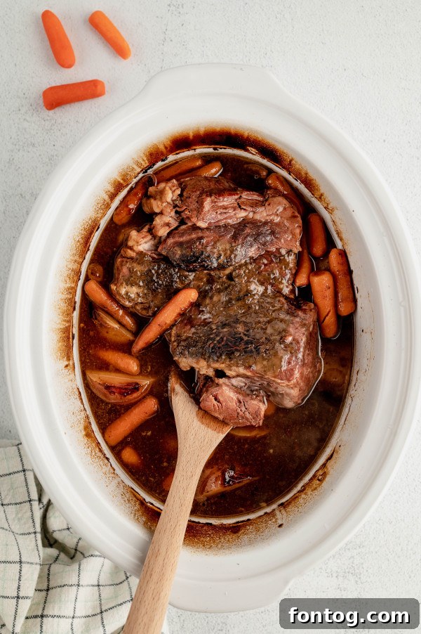 A tender gluten-free slow cooker roast, ready for a family dinner.