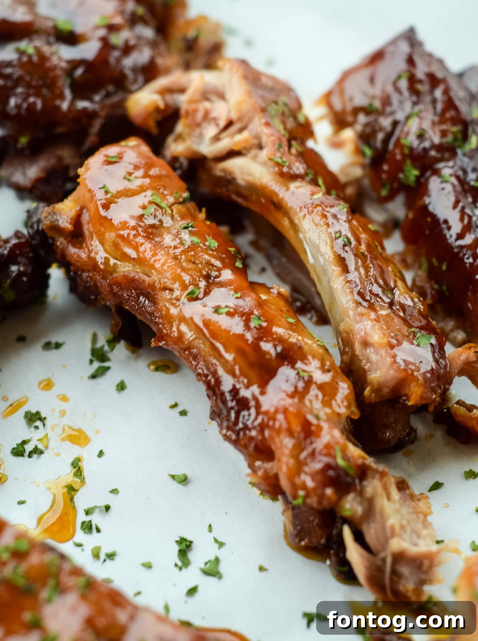 A delicious rack of slow cooker apple BBQ ribs, perfectly cooked.