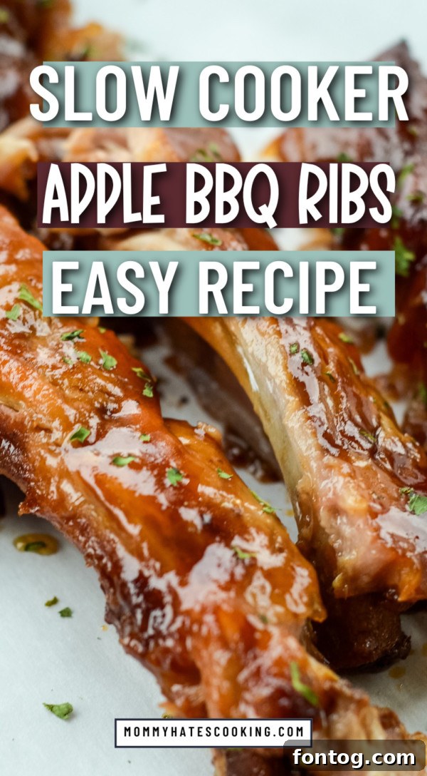 A high-quality image of Slow Cooker Apple BBQ Ribs for Pinterest sharing.