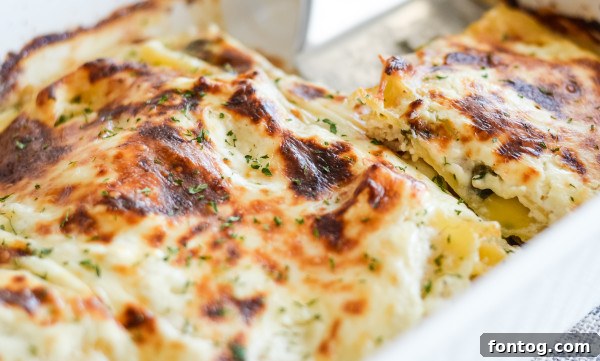 unbaked gluten free garlic chicken lasagna, ready for the oven