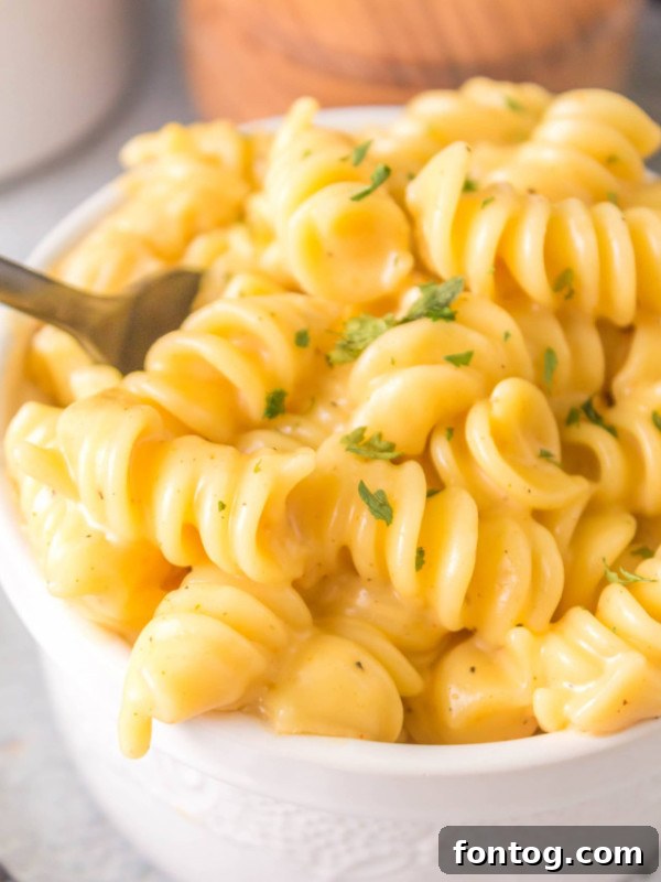 Creamy pressure cooker mac and cheese with rotini pasta