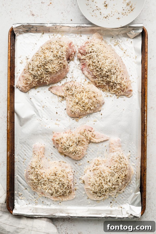 Raw chicken pieces, ready for coating