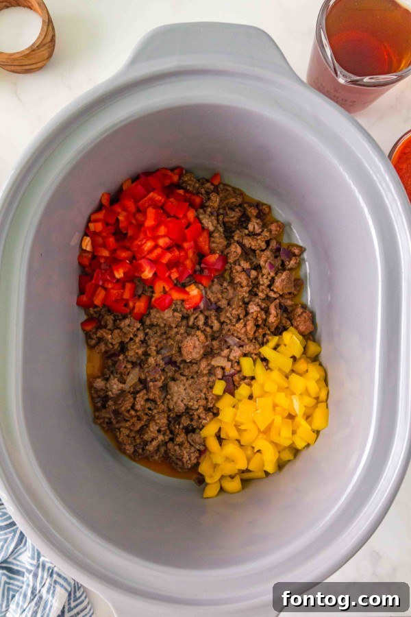All the fresh ingredients for gluten-free slow cooker taco pasta laid out