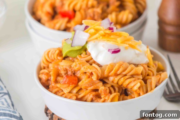 Gluten-free slow cooker taco pasta in a serving bowl