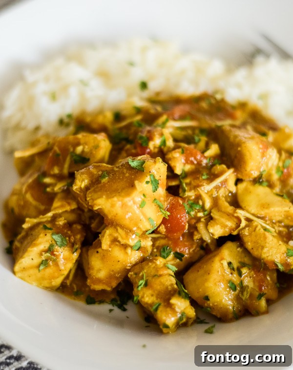 Creamy Pressure Cooker Coconut Chicken Curry 2 Delicious pressure cooker coconut chicken curry served in a bowl with jasmine rice