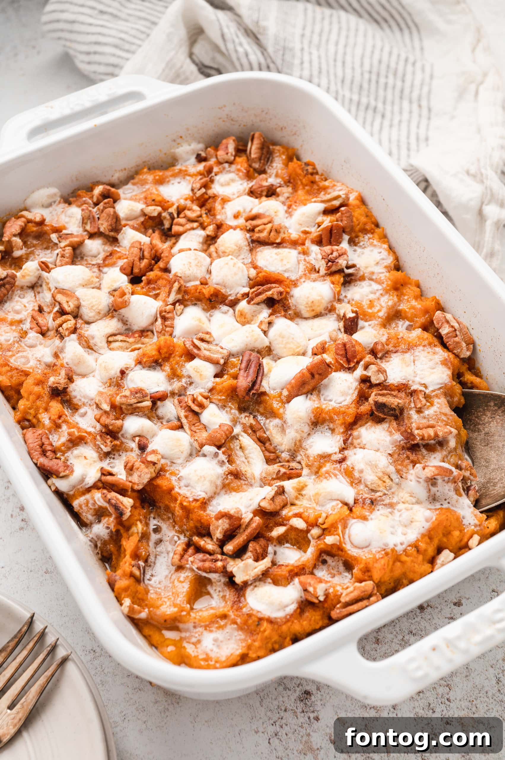 Maple Pecan Sweet Potato Casserole with toasted pecans