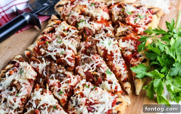 How to Make Grilled Pizza - A beautifully grilled pizza with melted cheese and toppings.