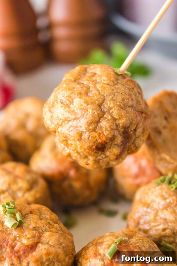 Gluten-free baked turkey meatballs with golden-brown breadcrumbs, ready to serve