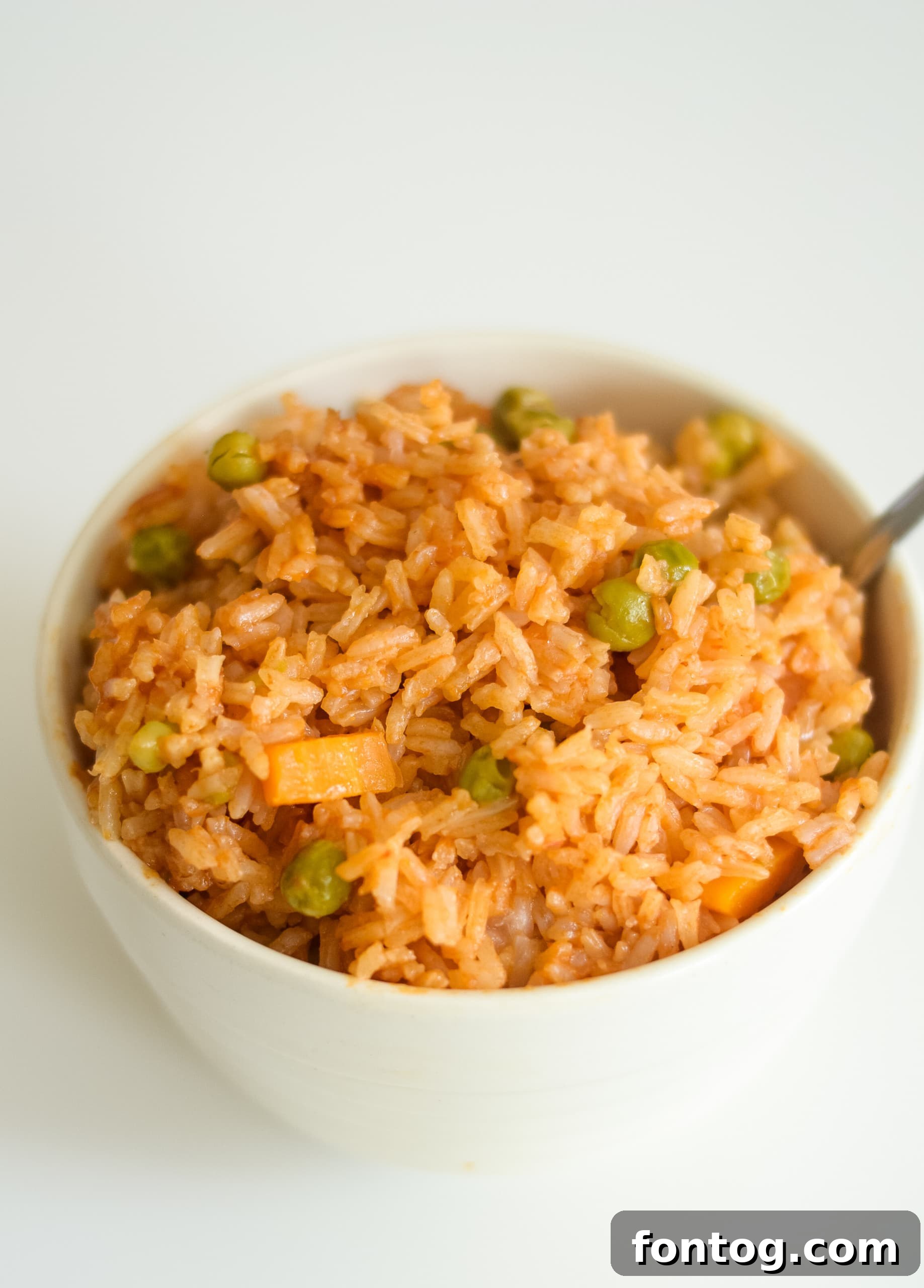Spanish Rice in a bowl with cilantro.