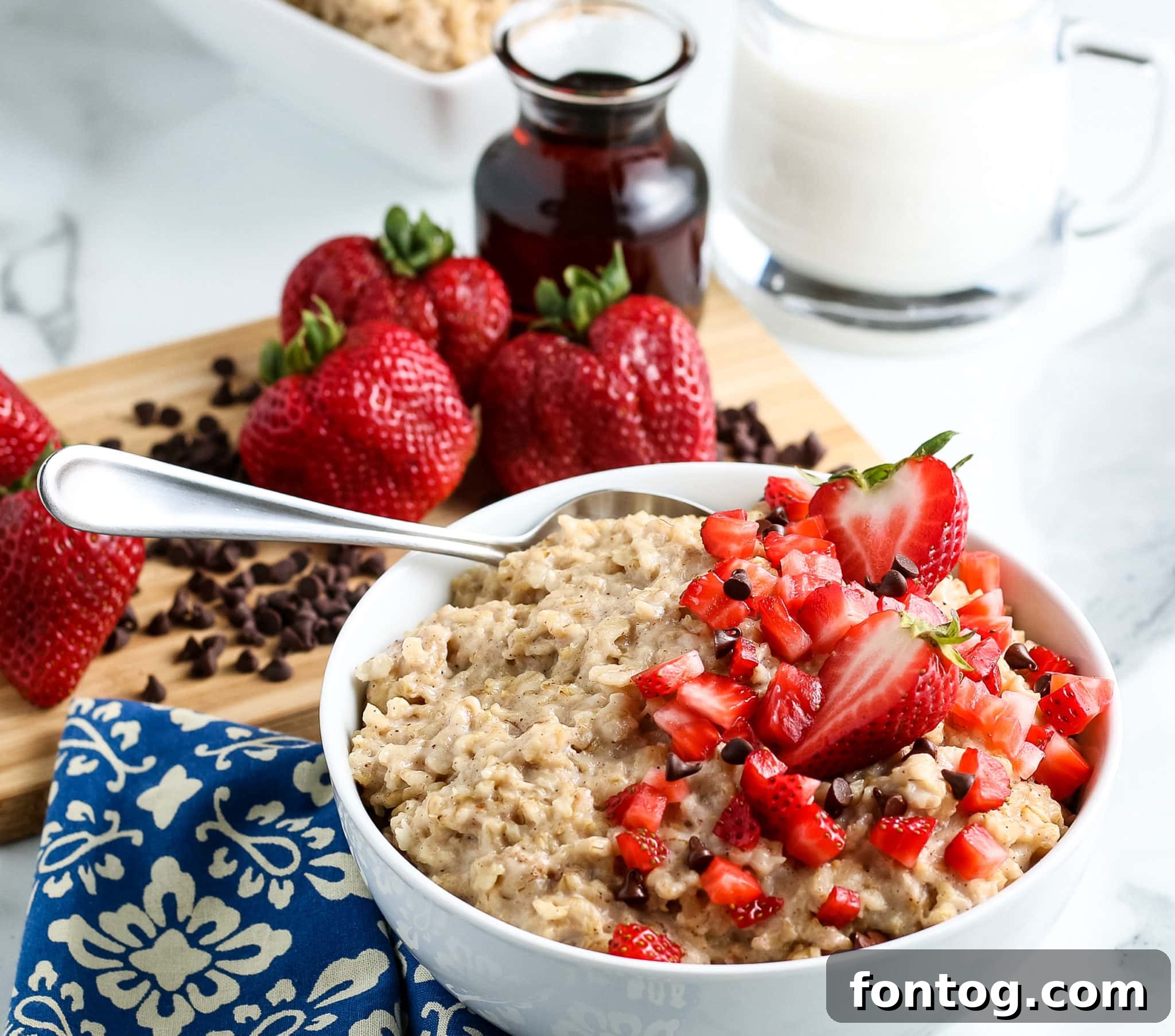 Oatmeal in a bowl with fruit.