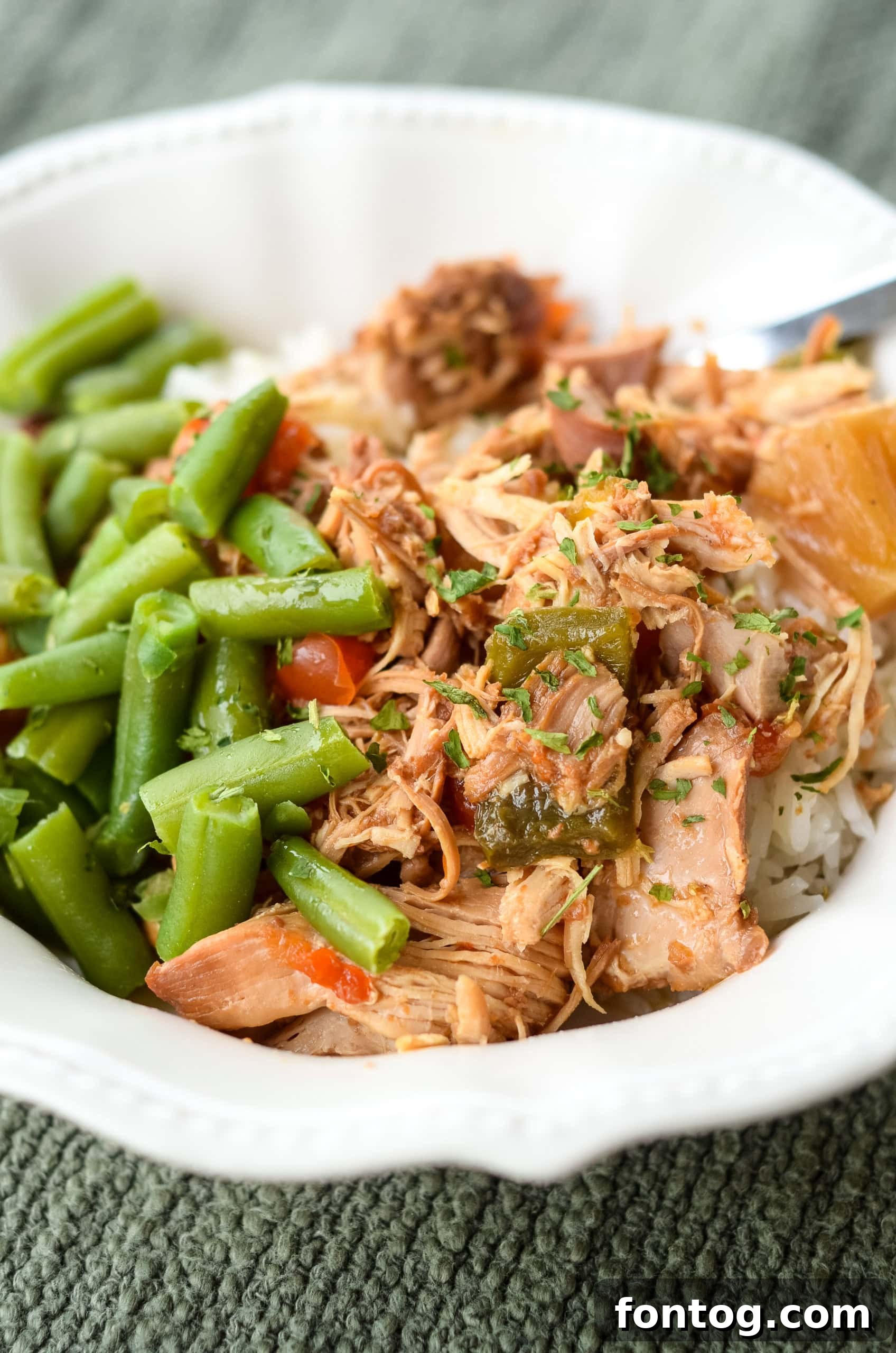 Slow cooker Hawaiian chicken on a plate.