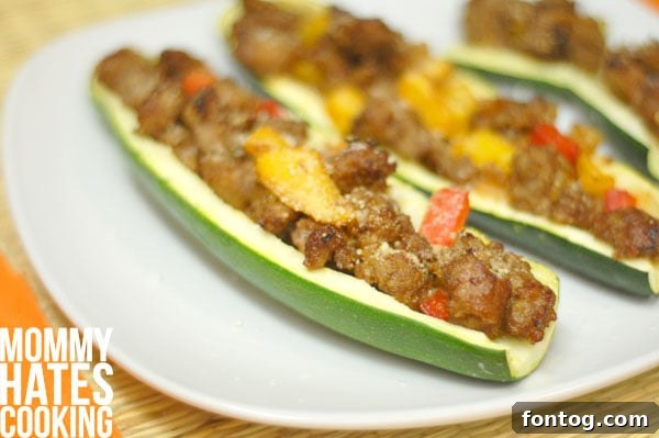 Delicious Parmesan Pork Zucchini Boats, a healthy and easy dinner idea.