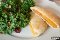 Warm Cheesy Chicken Cranberry Kale Salad