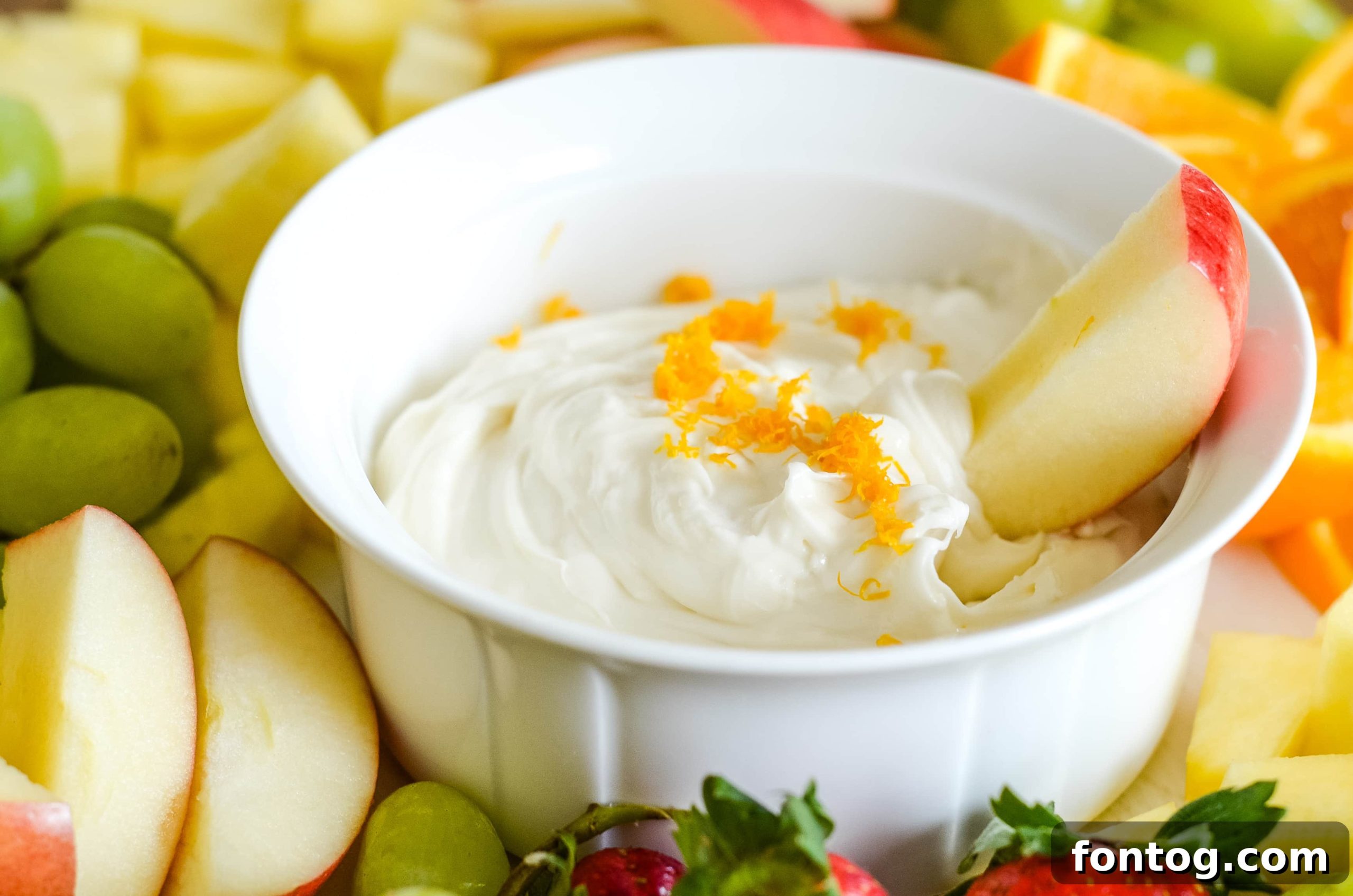 Cream Cheese Fruit Dip served with a fruit platter