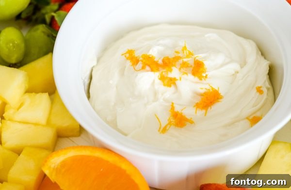 Close-up of Cream Cheese Fruit Dip with a variety of fruits