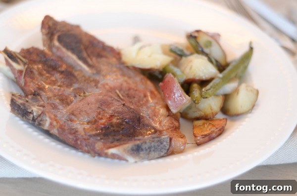 One-Pan Rosemary Pork Chops 5 Cooked One-Dish Rosemary Pork Chops fresh out of the oven
