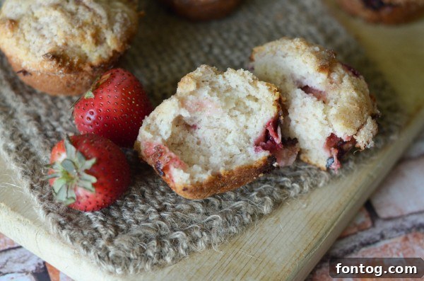 A plate of Strawberry Crumble Muffins ready to be served.