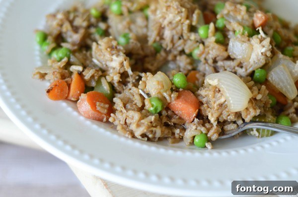 Homemade Fried Rice with perfectly scrambled egg and fresh greens