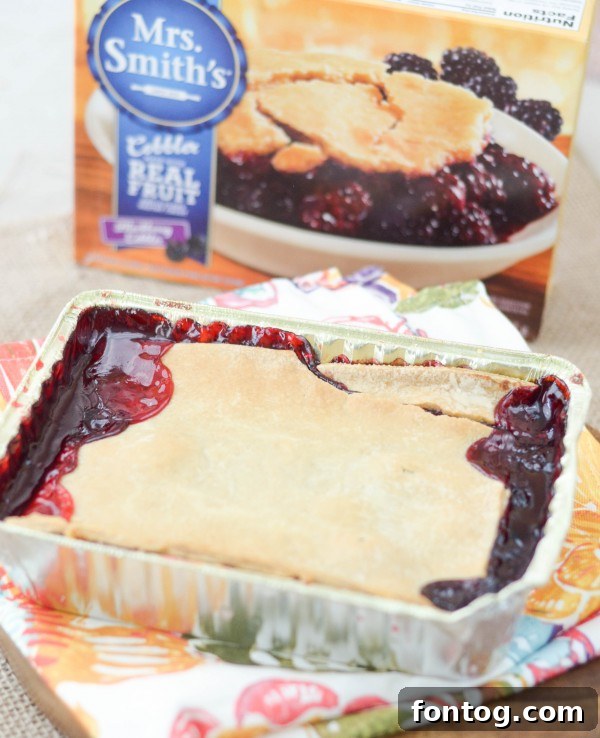 Layered Blackberry Cobbler Ice Cream Cake in a baking dish