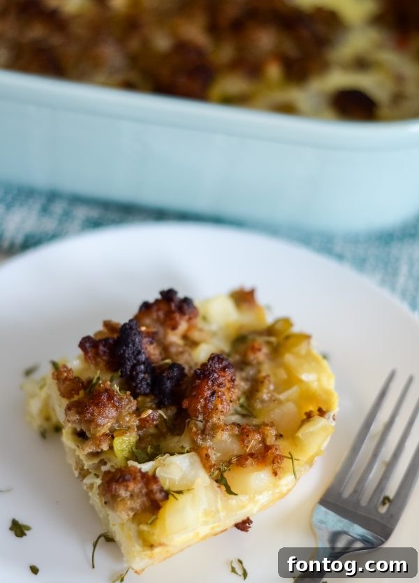 Ultimate Sausage Breakfast Bake 6 Sausage breakfast casserole in a baking dish before cooking