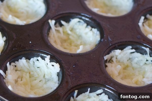 Breakfast Hash Brown Nests 4 Ingredients for Hash Brown Egg Cups laid out on a kitchen counter.