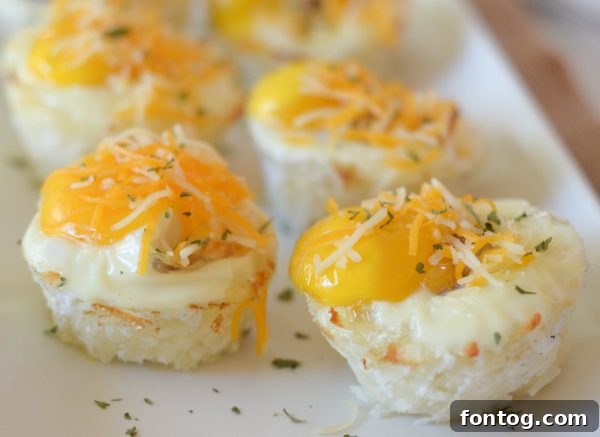 Breakfast Hash Brown Nests 8 Cracking The Happy Egg Co. organic eggs into hash brown cups.