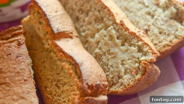 High Fiber Banana Bread slices on a cooling rack