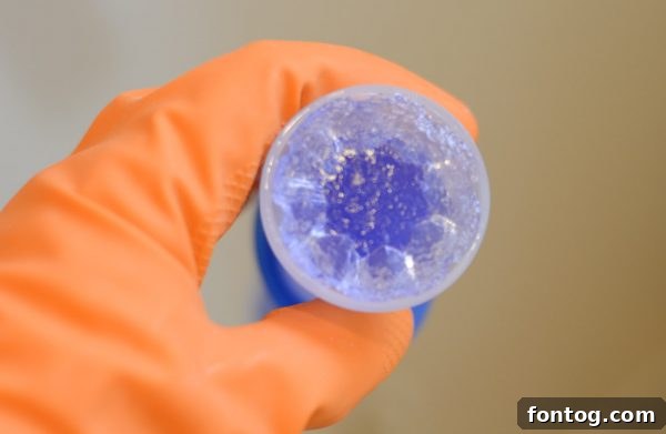 Scrubbing Bubbles cleaning products displayed neatly on a white bathroom counter, ready for use.