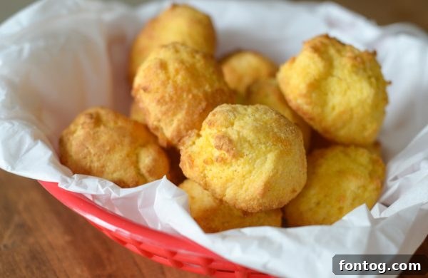 Easy Air Fryer Hush Puppies, golden brown and crispy, served hot