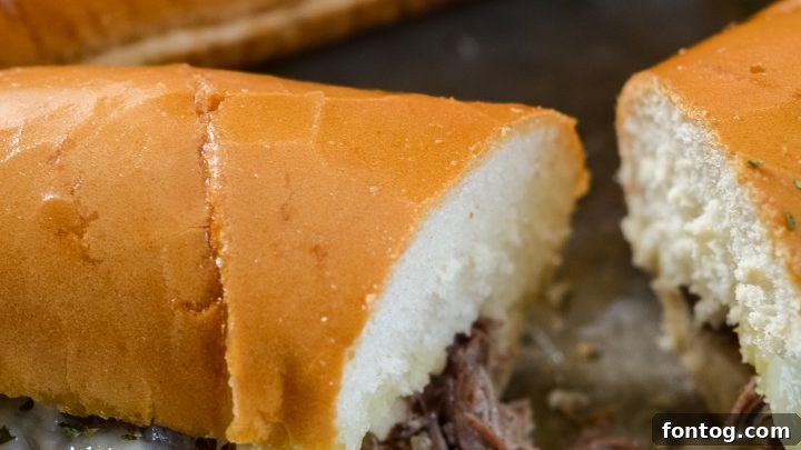 Mouth-watering slow cooker French dip sandwiches with tender beef and a rich au jus for dipping.