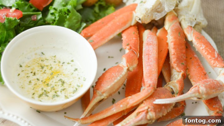 Plated Snow Crab Legs with melted garlic butter