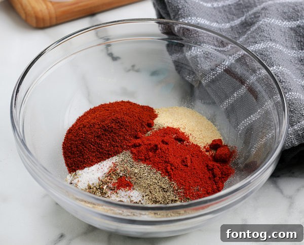 Ingredients for Homemade Taco Seasoning laid out on a surface