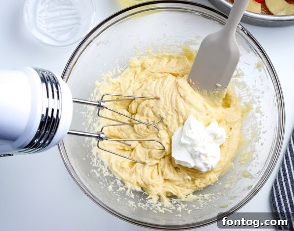 Gluten-free pineapple cake batter being mixed.